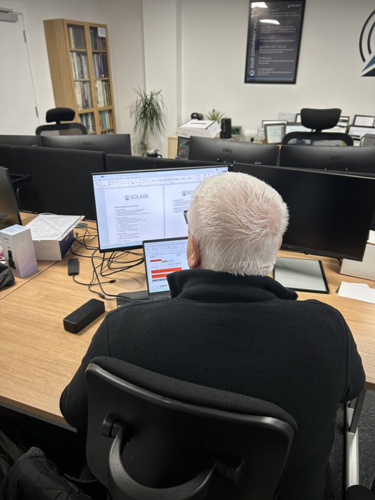 Stuart working at computer